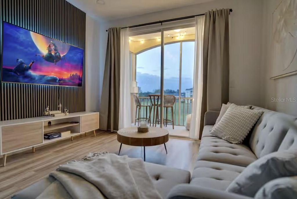 Photo of 8103 Coconut Palm Way #203, Kissimmee, FL 34747 (MLS # S5146102)