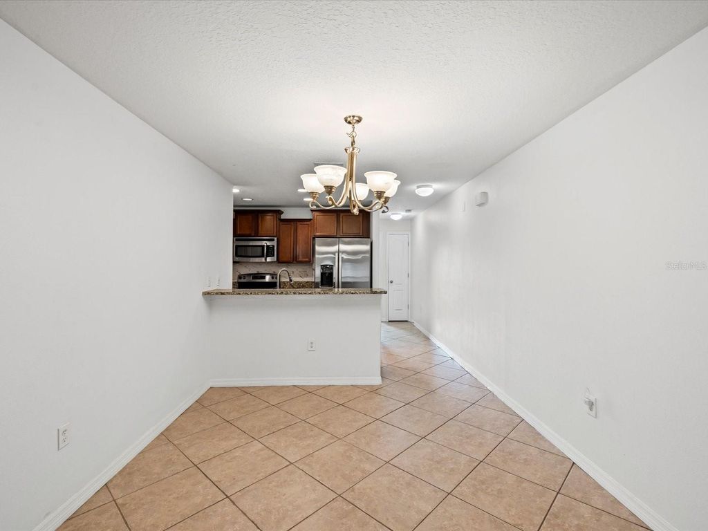 Photo of 9779 Trumpet Vine Loop, Trinity, FL 34655 (MLS # TB8454448)