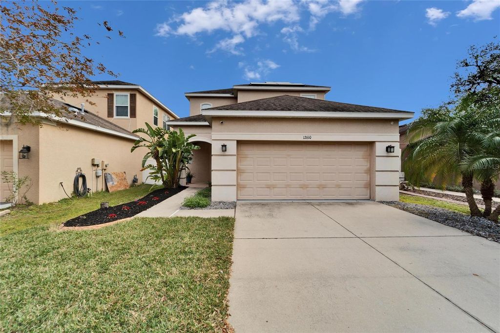 Photo of 12610 Geneva Glade Drive, Riverview, FL 33578 (MLS # TB8435408)