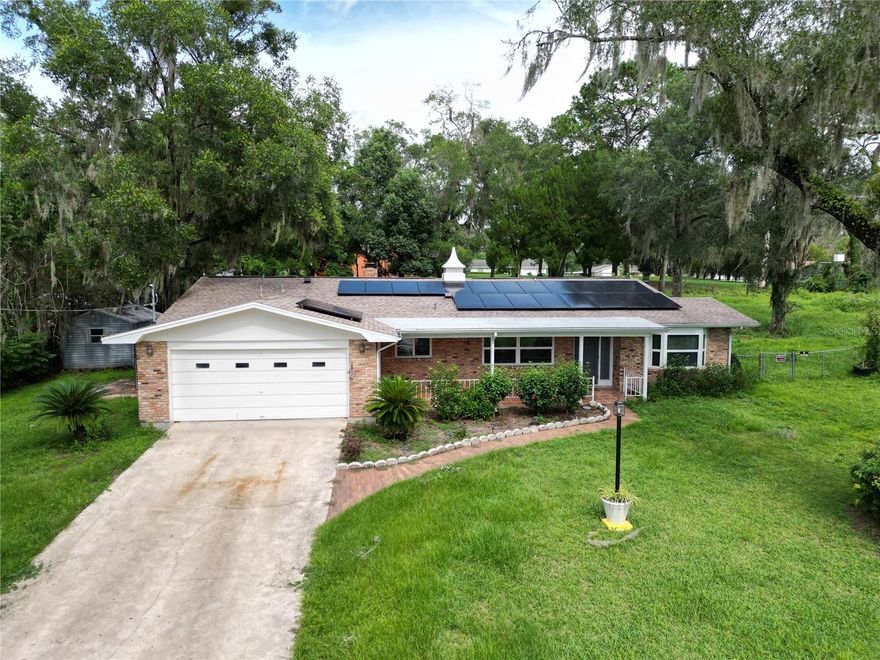 Welcome to this fully renovated 3-bedroom, 2-bath home in the heart of Inverness! Sitting on a generous 0.75 Acre fully fenced lot with no HOA, this home combines modern updates with everyday comfort. Inside you’ll find bright, open living spaces with new windows, updated cabinets, luxury vinyl floors, and a cozy fireplace. The ceilings have been smoothed for a fresh look, while the new brick paver patio creates the perfect space for outdoor entertaining. Recent updates include a new A/C and water heater (2024), plus a premium water softener system. Best of all, the home is equipped with solar panels, giving you eco-friendly energy efficiency and long-term savings. The spacious primary suite includes a walk-in closet, and the home also offers an attached 2-car garage, laundry inside, and water filtration system. All just minutes from schools, parks, lakes, and shopping, this home is move-in ready and waiting for you! Book your private tour today!