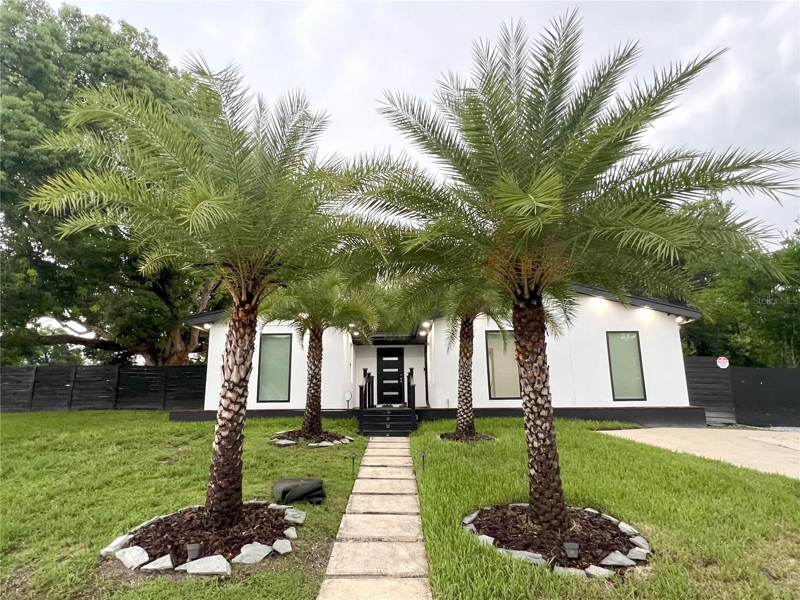 No HOA! Completely remodeled. 3 bedroom 2 bath modern single family home. Perfect for the first time homebuyers, investors or anyone seeking a move in ready home without the burden of a HOA. For easy clean enjoy the convenience of luxury vinyl plank flooring throughout, no carpet to deal with. The kitchen is a chefs delight equipped with stainless steel appliances and quartz countertops. There is an extensive number of recessed lighting on the exterior of the home's soffit. All this and located on a corner lot that lends itself to privacy, boasting an expansive yard ideal for outdoor gatherings or simply enjoying the outdoors in your tiled 25x12 screened in porch. Just minutes to I-4. grocery stores, hospitals and restaurnants.