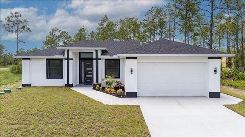 Photo of 1201 Johns Avenue, Lehigh Acres, FL 33972 (MLS # C7516365)