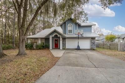 Photo of 6658 NW 36th Terrace, Gainesville, FL 32653 (MLS # GC541674)