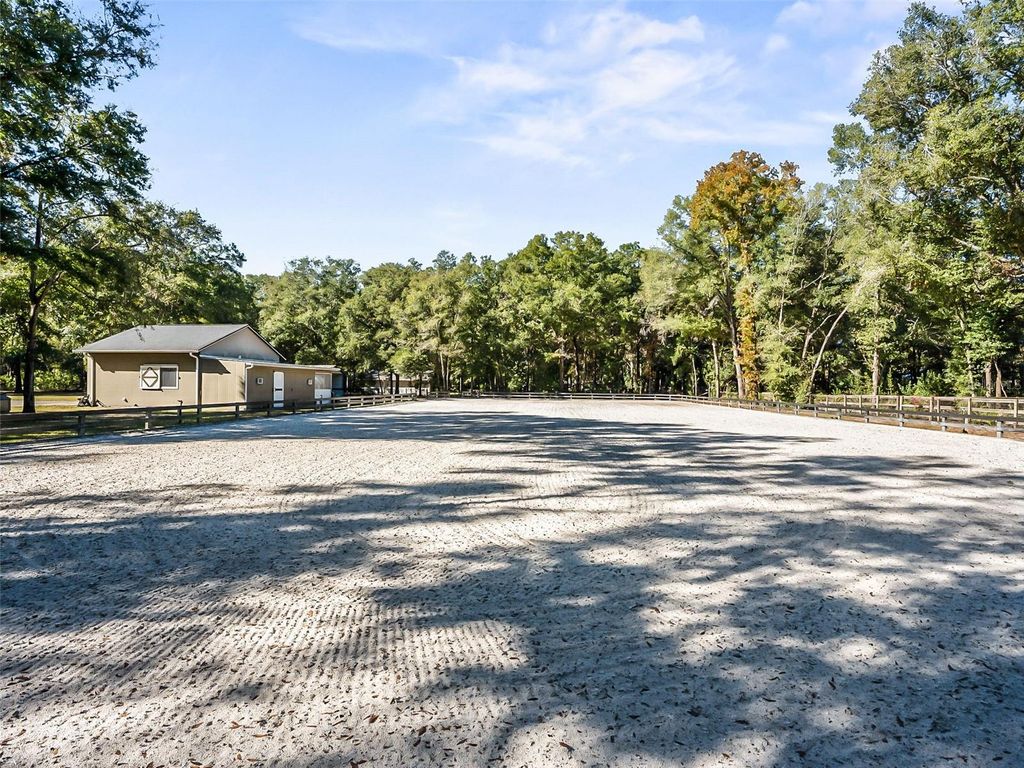 Photo of 880 NW 70th Terrace, Ocala, FL 34482 (MLS # OM715958)