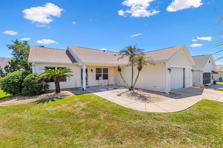 Bond Paid / Roof 2021 / HVAC 2024 / TURNKEY 2 Bedroom, 2 Bathroom Carolina Cottage Home with Florida Room and Whole House Solar System in the Village of Santo Domingo in The Villages, Florida. 
Featuring an open layout, spacious rooms, multiple indoor and outdoor living areas, and a whole house solar system, this home offers an excellent opportunity to enjoy the Florida lifestyle with comfort and convenience.
A welcoming front porch creates the perfect setting to relax and enjoy the neighborhood atmosphere. Inside, the open floorplan is centered around a kitchen island overlooking the main living area, creating a natural flow for entertaining and everyday living. A solar tube in the main living space enhances natural light, creating a bright and inviting interior.
The home features no carpet throughout, providing easy maintenance and a clean, cohesive look.
The added Florida room offers flexible year-round living space, ideal for relaxing, hobbies, or additional seating, while the adjacent screened enclosure creates a comfortable outdoor retreat for enjoying Florida’s beautiful weather. A sliding glass door from the primary suite provides direct access to this peaceful outdoor space.
The primary suite features a walk-in closet and private ensuite bathroom with dual sinks and a step-in shower. The larger guest bedroom also includes a walk-in closet, providing comfortable accommodation for visitors. The guest bathroom features a convenient tub and shower combination.
Additional highlights include an inside laundry room with utility sink, cabinetry, and its own solar tube for natural lighting.
The two-car garage offers built-in storage shelving and a garage screen, adding both functionality and airflow.
This home is equipped with a whole house solar system designed to improve energy efficiency and help reduce utility costs. The solar system is currently leased.
Located in the established Village of Santo Domingo, this home offers convenient golf cart access to golf courses, recreation centers, shopping, dining, entertainment, and all the amenities that make The Villages, Florida one of the country’s most sought after active adult communities.
With its furnished offering, flexible living spaces, Florida room, screened outdoor area, and energy efficient solar system, this home presents an excellent opportunity for seasonal or full time living in The Villages.
Schedule your private showing today.