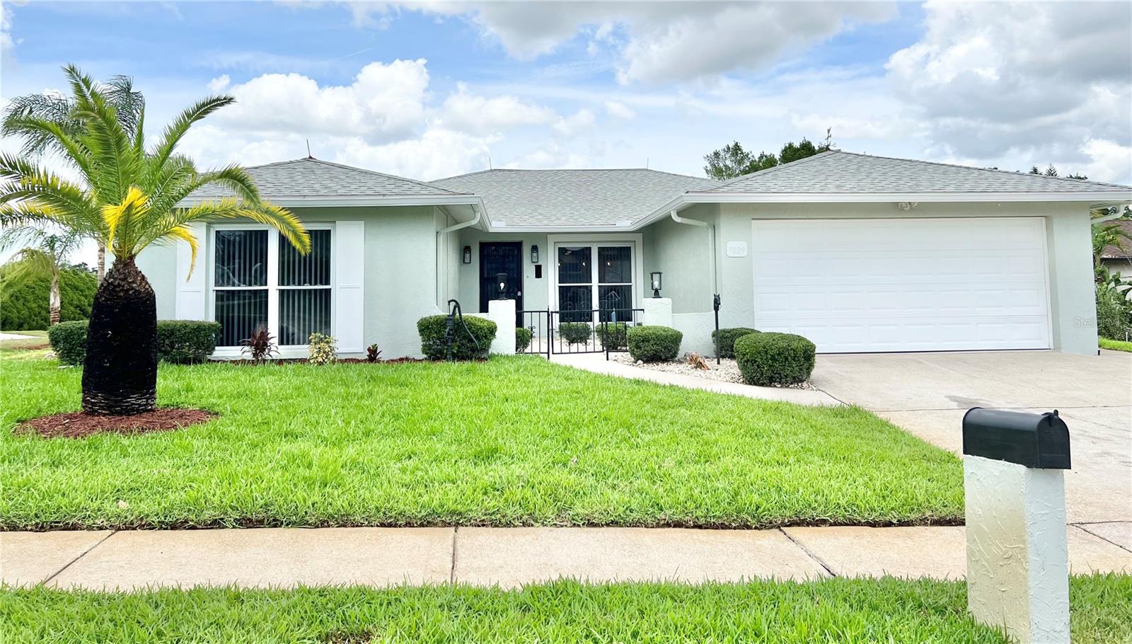 This 3/2/2 open floor plan home on a huge corner lot looks brand new. Beautiful Gourmet chefs kitchen has white shaker cabinets, Quartz counter tops, stainless appliances, led recessed lights, crown molding and subway tile backsplash. The 2 large bathrooms have been redone from top to bottom (Quartz, marble, porcelain tile). New ceiling fans and light fixtures thru-out. Grey distressed wood LVP flooring throughout entire living space. New Window Treatments, new 5 1/2" Baseboards, new 6 panel doors and hardware. Freshly painted inside and outside. Fresh landscape. Enjoy the covered lanai with vinyl windows. The sprinkler system is on a well. Minutes to gulf beaches, shopping, dining, the Anclote fishing pier and historic Tarpon Springs. Do not miss this one!!