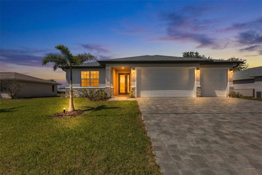 This stunning 4-bedroom, 3-bathroom pool home is situated in the highly desirable Deep Creek neighborhood. Constructed in 2024, the home features a modern open floor plan that is both functional and inviting. 
Upon entering, you are welcomed by high ceilings and tile flooring throughout, which enhance the spacious feel of the home. The carefully selected color palette creates a bright and inviting atmosphere. The kitchen is designed to be the heart of the home, seamlessly flowing into the family room and dining area, making it ideal for entertaining. Modern cabinetry, stainless-steel appliances, a large pantry, and a substantial island provide both style and practicality, perfect for family meals or gatherings with friends. 
The primary suite offers ample space.  It features two walk-in closets and a master bathroom with dual sinks and a linen closet for added convenience. The split floor plan ensures privacy for guests or family members, while the additional spacious bedrooms can easily accommodate guests, serve as a home office, or meet the needs of a growing family. 
Hurricane impact windows and doors provide peace of mind, and the property is not located in a flood zone, offering additional security and comfort. 
The exterior of the home is perfect for entertaining, with a large lanai and a private spa. This area is ideal for socializing, relaxing, or simply enjoying your favorite beverage while lounging beside the heated, sparkling saltwater pool.  The backyard offers plenty of space to play with your fur babies or barbecue and entertain family and friends.
The three-car garage features epoxy flooring and provides ample space for cars, recreational equipment, storage, and tools. The driveway is finished with pavers and offers plenty of parking space for multiple vehicles. 
Residents can enjoy convenient access to local attractions such as golf courses, pickleball courts, beaches, restaurants, shopping centers, Fisherman’s Village, and the Sun Seekers Resort.