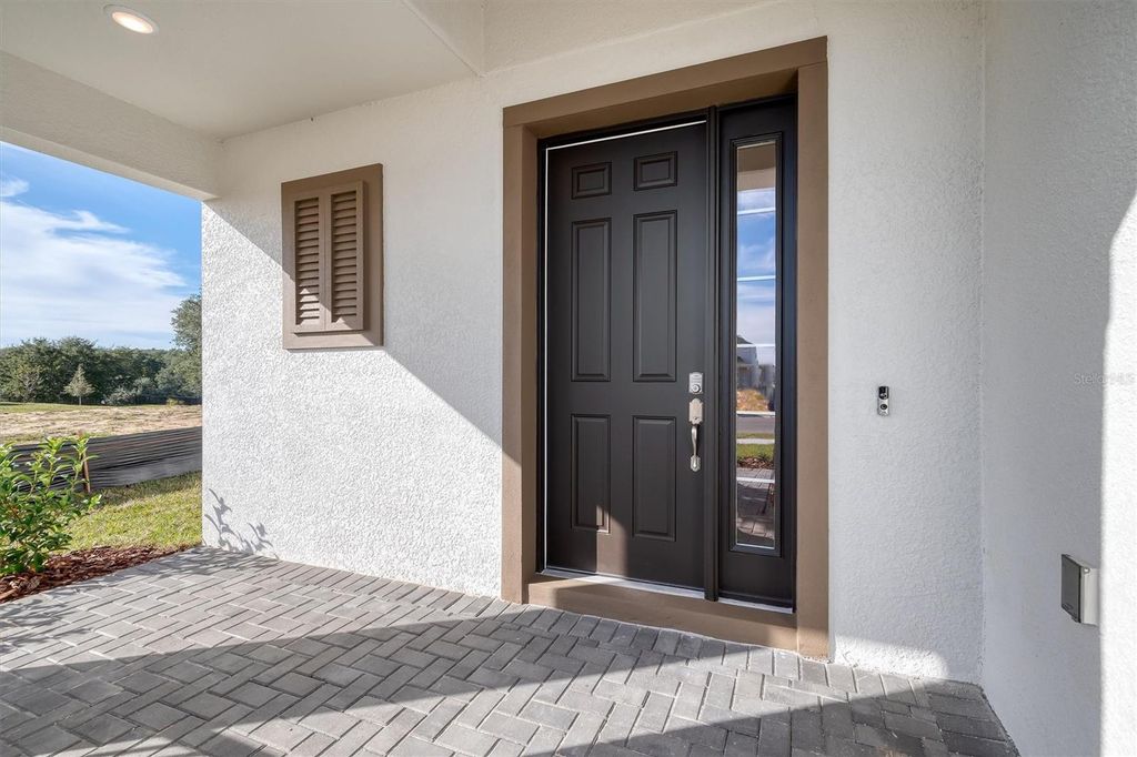 Photo of 3036 Suraj Circle, Tavares, FL 32778 (MLS # O6386241)