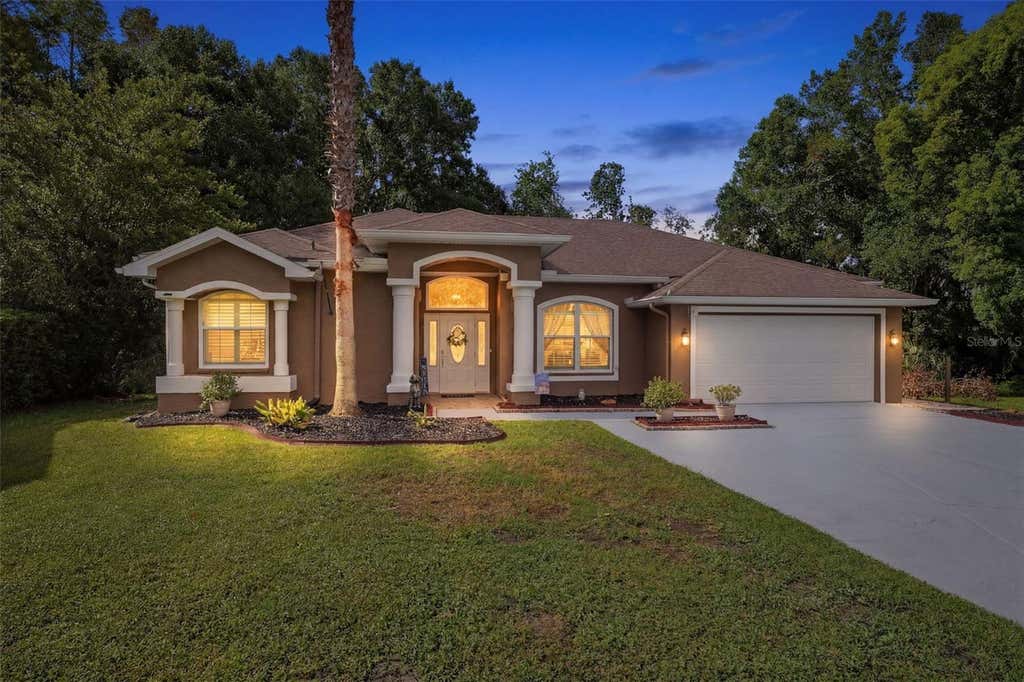 Photo of 4710 Basswood Street, Land O Lakes, FL 34639 (MLS # W7887610)