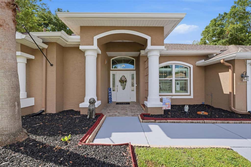Photo of 4710 Basswood Street, Land O Lakes, FL 34639 (MLS # W7887610)
