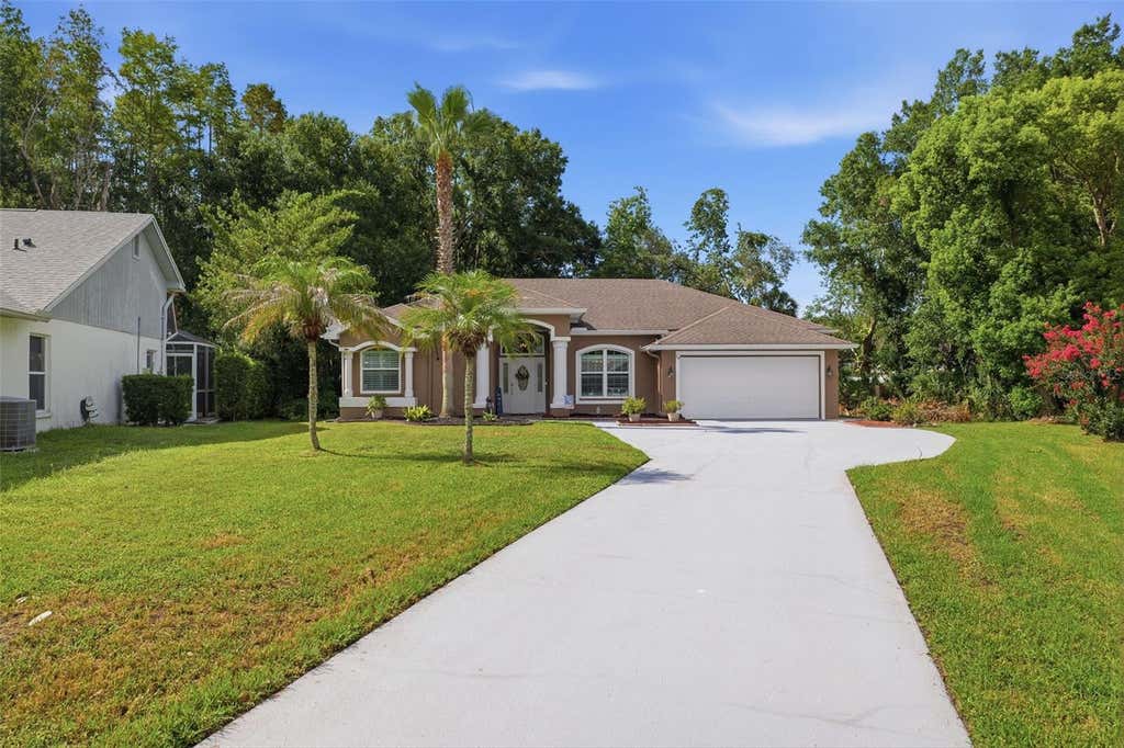Photo of 4710 Basswood Street, Land O Lakes, FL 34639 (MLS # W7887610)