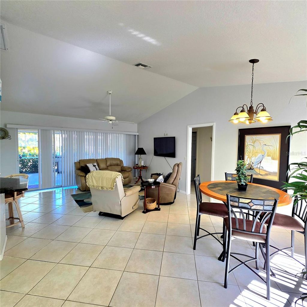 Photo of 23396 Mullins Avenue, Port Charlotte, FL 33954 (MLS # C7521513)