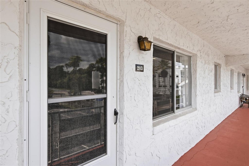 Photo of 1100 Martinique Drive #203, Winter Haven, FL 33884 (MLS # L4964839)