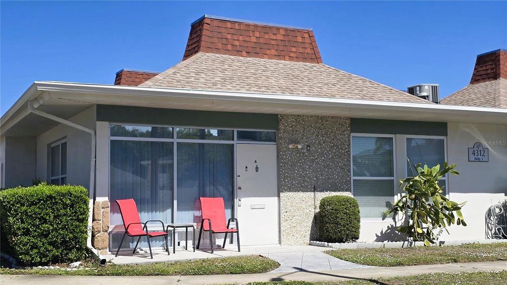 Photo of 4312 Tahitian Gardens Circle #A, Holiday, FL 34691 (MLS # TB8492124)