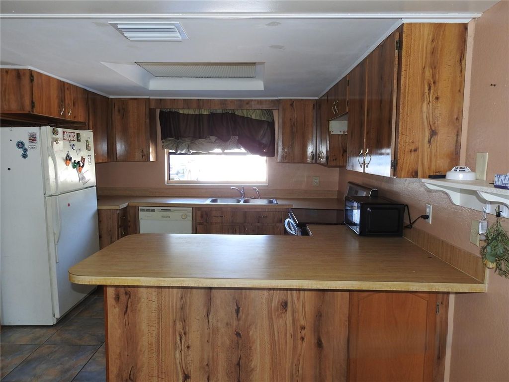 Photo of 2128 Linwood Avenue, Spring Hill, FL 34608 (MLS # TB8489155)