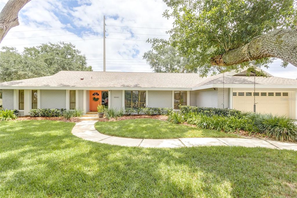 Photo of 5841 Medinah Way, Orlando, FL 32819 (MLS # O6369358)