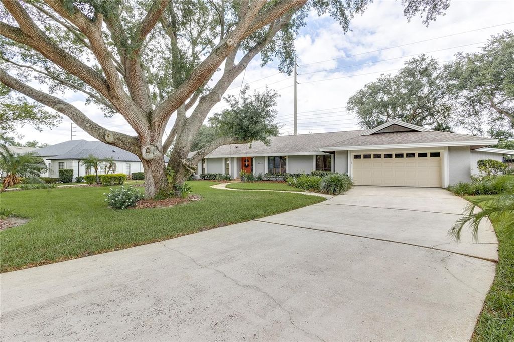 Photo of 5841 Medinah Way, Orlando, FL 32819 (MLS # O6369358)