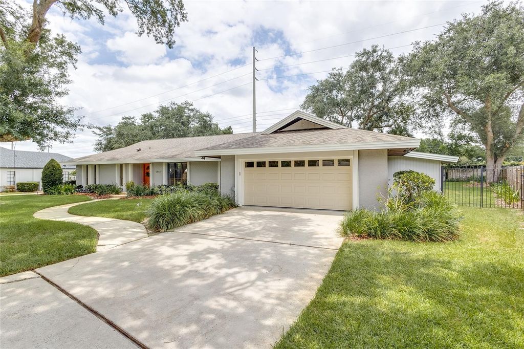 Photo of 5841 Medinah Way, Orlando, FL 32819 (MLS # O6369358)