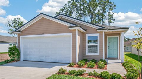Photo of 28 Flagstick Lane, Bunnell, FL 32110 (MLS # FC314661)