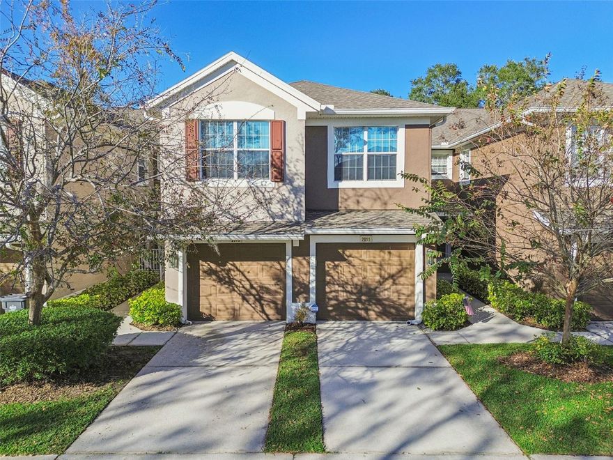 Immaculate and truly move-in ready, this residence in Villa Serena of Riverview stands out for its exceptional condition and thoughtful updates. Renovated in 2022 and meticulously maintained, the home offers a like-new feel throughout. Significant improvements including a new roof in 2023, an air conditioning system replaced in 2021, and a water heater installed in 2020 provide lasting value and peace of mind, making this one of the most updated units currently available. All living spaces are arranged on a single level and enhanced by vaulted ceilings and abundant natural light, creating an open and inviting atmosphere. The living and dining areas flow seamlessly, offering a functional layout well suited for both daily living and entertaining. The formal dining area is highlighted by a custom wall unit featuring a dry bar, open shelving, and closed cabinetry, providing additional storage for glassware and serving pieces while adding architectural interest. The kitchen is efficiently designed and well appointed, featuring resurfaced 42-inch cabinetry, quartz countertops, stainless steel appliances, and a thoughtfully integrated workstation with dedicated storage for cookware and knives. Countertop seating provides additional flexibility, while a large pantry with built-in shelving offers exceptional storage. A nearby laundry closet is equipped with a newer washer and dryer for added convenience. The private balcony overlooks wooded and lake views, providing a quiet outdoor extension of the living space. The owner’s suite offers a spacious layout with a walk-in closet and an updated en-suite bath with dual sinks, modern fixtures, a vanity area, linen storage, and a walk-in shower. Two additional bedrooms are generously sized and adaptable for guest use, office space, or flexible living needs.  Additional updates include fresh interior paint throughout, updated doors and trim, newer carpeting, modern lighting and ceiling fans, upgraded electrical receptacles and switches, window treatments with blackout shades in the front bedrooms, and a new garage door with updated hardware and opener installed in 2023. Conveniently located near shopping, dining, parks, HWY 301, I-75, MacDill Air Force Base, and Tampa Bay beaches, this well-maintained home offers a level of finish, organization, and care that sets it apart within the community.