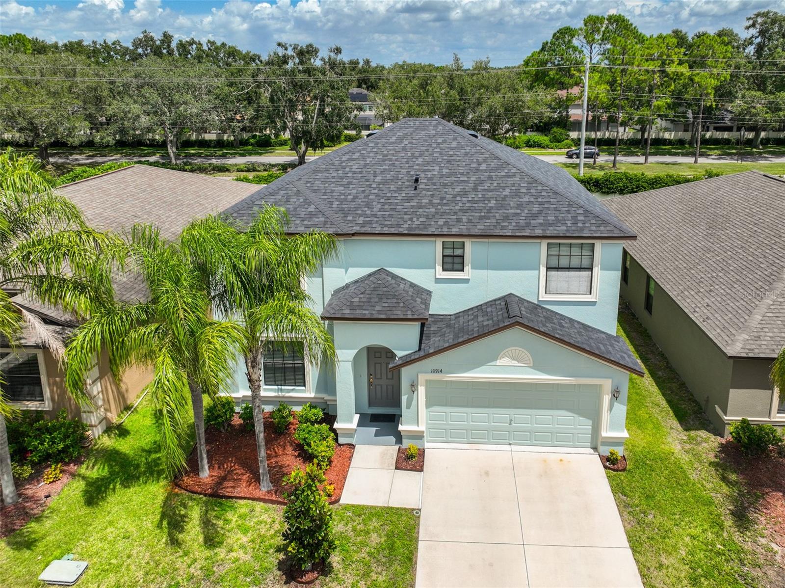 Welcome to your new home in the sought-after Summerfield Crossing community! This well-maintained 4-bedroom, 2.5-bathroom property offers the perfect blend of comfort, space, and functionality. Recent updates include a NEW ROOF and fresh interior/exterior paint in 2025, giving the home a modern and move-in ready appeal.
Step inside to a bright and airy main floor featuring an open-concept layout that seamlessly connects the large living room, kitchen, dining area, and cozy family room — ideal for everyday living and entertaining. The kitchen includes a walk-in pantry, and there’s a convenient half bath on the main level as well.
Upstairs, you'll find all four generously sized bedrooms, including a spacious primary suite with a large walk-in closet and a private en-suite bathroom. A centrally located utility room adds convenience to your daily routine.
Enjoy the outdoors year-round from the screened-in lanai, overlooking a large backyard with plenty of space for play, gardening, or relaxing.
Additional features include a 2-car garage and access to fantastic community amenities such as a swimming pool, fitness center, and more.
Don’t miss the opportunity to own this wonderful home in Summerfield Crossing — where comfort meets community!