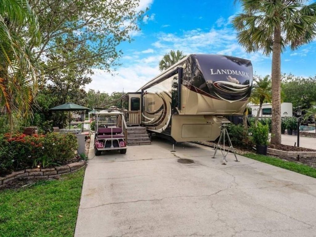 Photo of 579 Waterway Drive, River Ranch, FL 33867 (MLS # OM684990)