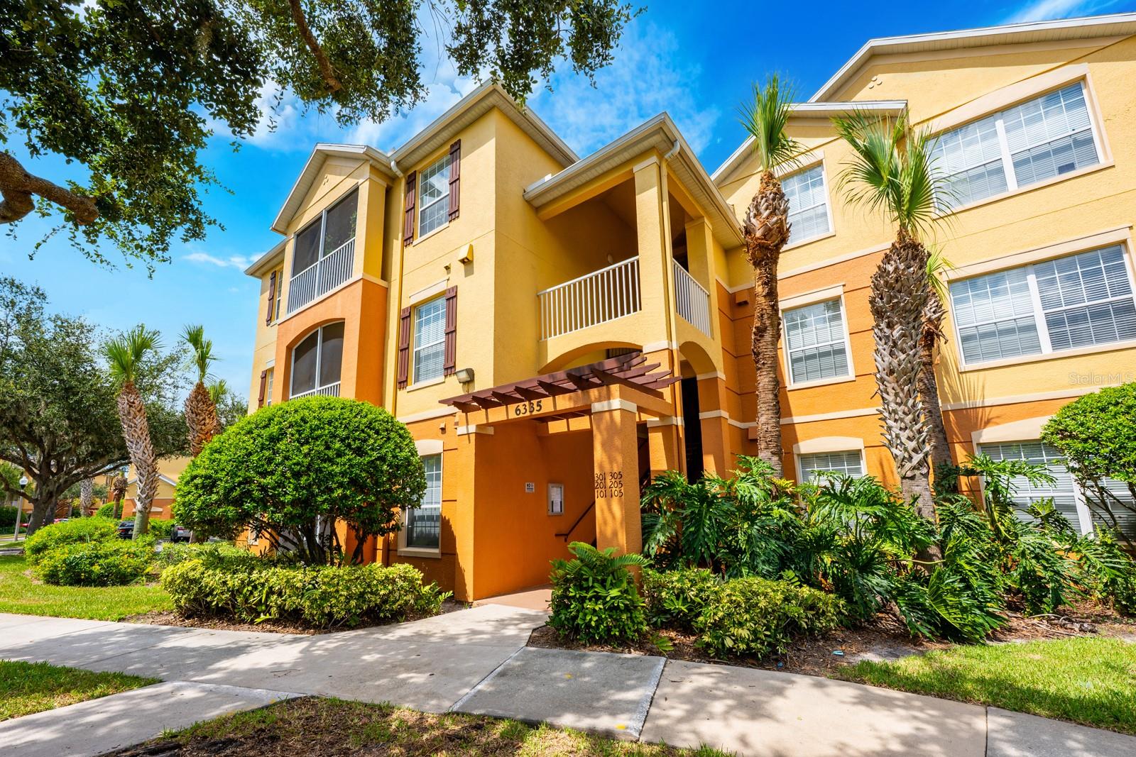 Ask about a lender-provided rate buy-down credit on this home! Seller may consider buyer concessions if made in an offer! ****Welcome to Horizons at Vista Lakes, a sought after GATED COMMUNITY in the heart of East Orlando! This top-floor 3-bedroom, 2-full bath condo offers the comfort of LOW MAINTENANCE LIVING with a spacious layout and access to outstanding community AMENITIES. Inside the home you will be pleased to find a SPLIT BEDROOM FLOOR PLAN designed for both privacy and functionality. The OPEN LIVING AND DINING areas flow seamlessly together, filled with NATURAL LIGHT from large sliding glass doors that extend the space outdoors. Step out onto your SCREENED BALCONY and enjoy relaxing views of the community and the perfect spot for morning coffee or evening unwinding. The modern kitchen features a comfortable layout with ample cabinet and counter space, plus pantry storage, making everyday cooking and entertaining a breeze. Three generously sized bedrooms and two full baths provide plenty of room to spread out, while the IN-UNIT LAUNDRY adds an extra layer of convenience. Light and bright finishes throughout create an airy atmosphere that makes this third-floor condo feel even more expansive. Beyond your door, Horizons at Vista Lakes offers an active lifestyle with access to a RESORT-STYLE COMMUNITY POOL with poolside seating, fitness center, tennis courts, community park, and playground. You will also find walking and jogging trails, sports fields, and green spaces that bring the community together. The HOA covers water, sewer, trash, pest control, and exterior maintenance, so you can enjoy truly effortless living! The location is hard to beat being just minutes from Publix, shopping, dining, A-RATED SCHOOLS like Vista Lakes Elementary, the Orlando International Airport, Lake Nona Medical Center, Lee Vista Promenade, and major roadways like SR 417, 408, and 528. Whether you are heading to theme parks, Downtown Orlando, or the coast, this central address gives you easy access to every destination. If you have been searching for a bright and spacious home in a gated community with incredible amenities, Horizons at Vista Lakes is the place to be. Schedule your private showing today!
