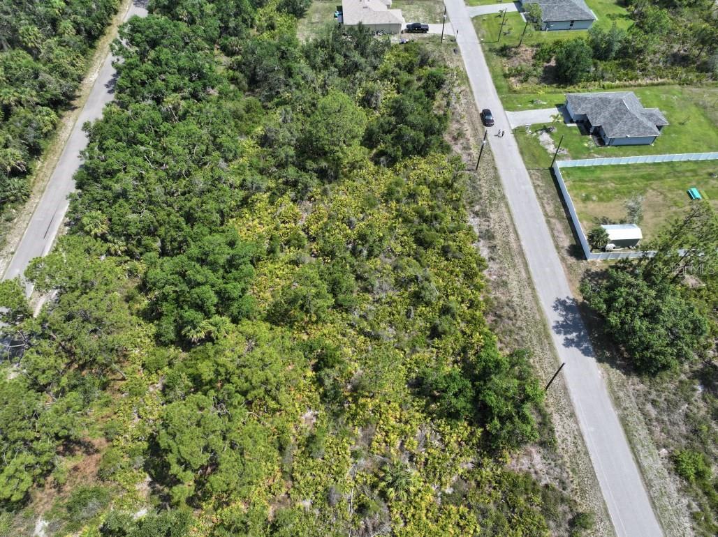 Discover the perfect opportunity to build your dream home on this exceptional lot in North Port! this spacious property offers privacy and tranquility with minimal nearby neighbors. Surrounded by beautiful new construction, the neighborhood is rapidly growing and full of potential. Whether you're looking to invest or create a custom residence, this lot has it all—natural beauty, a serene setting, and a prime location. Don’t miss out on this hidden gem—come see it today and envision the possibilities!