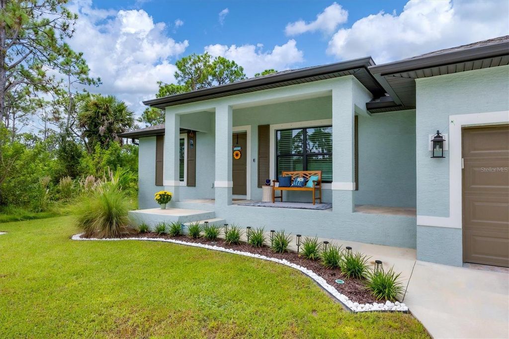 Photo of 14325 Mcfarland Avenue, Port Charlotte, FL 33981 (MLS # D6143717)