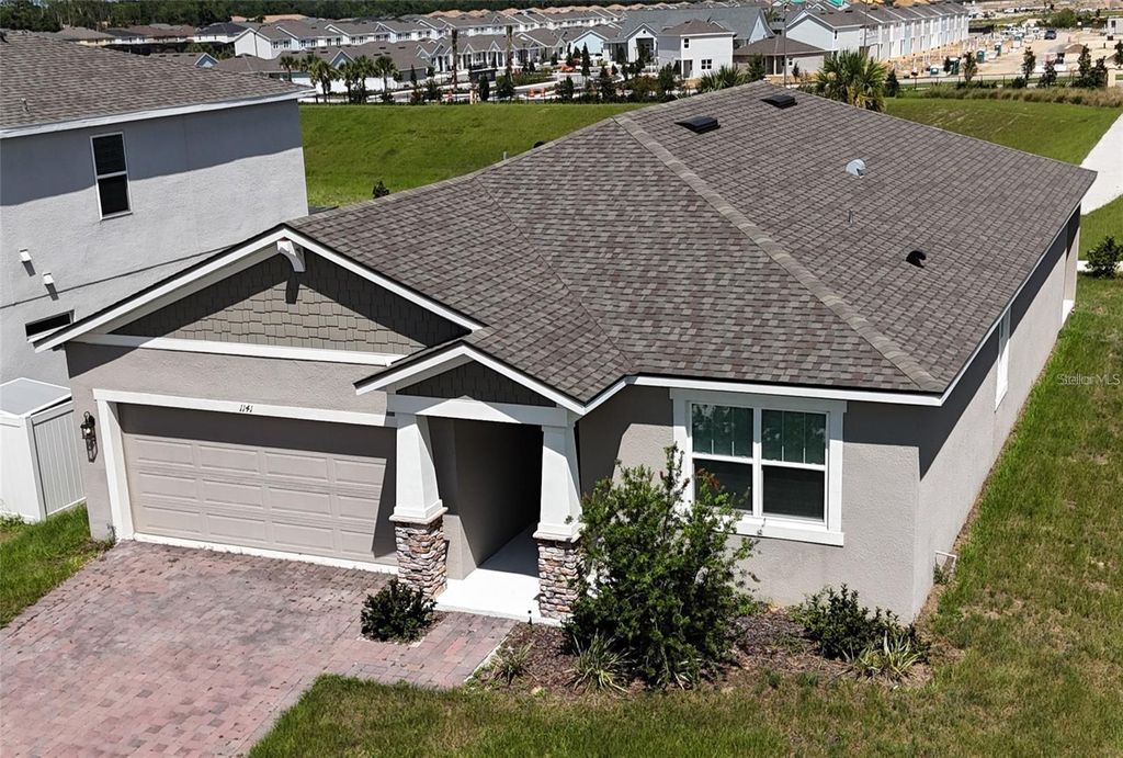 Photo of 1141 Lakeshore Breeze Place, Kissimmee, FL 34747 (MLS # O6397466)