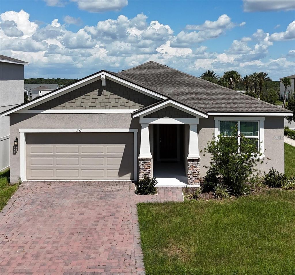 Photo of 1141 Lakeshore Breeze Place, Kissimmee, FL 34747 (MLS # O6397466)