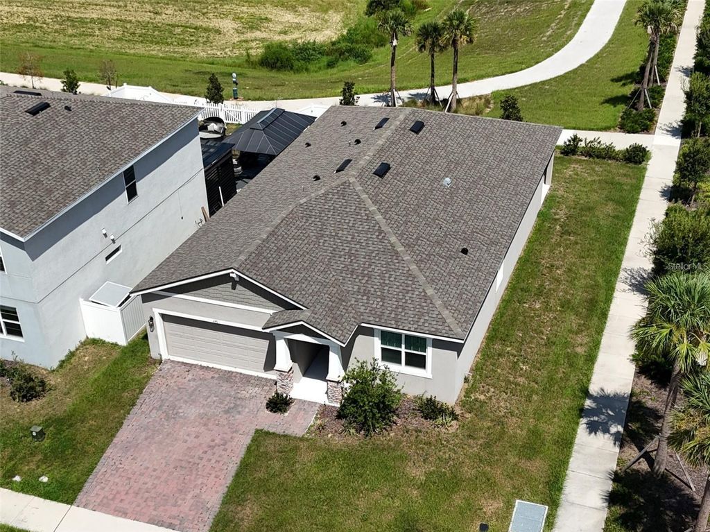 Photo of 1141 Lakeshore Breeze Place, Kissimmee, FL 34747 (MLS # O6397466)