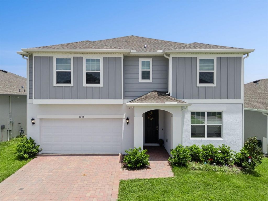 Photo of 6808 Serpent Hawk Lane, Howey In The Hills, FL 34737 (MLS # O6423864)