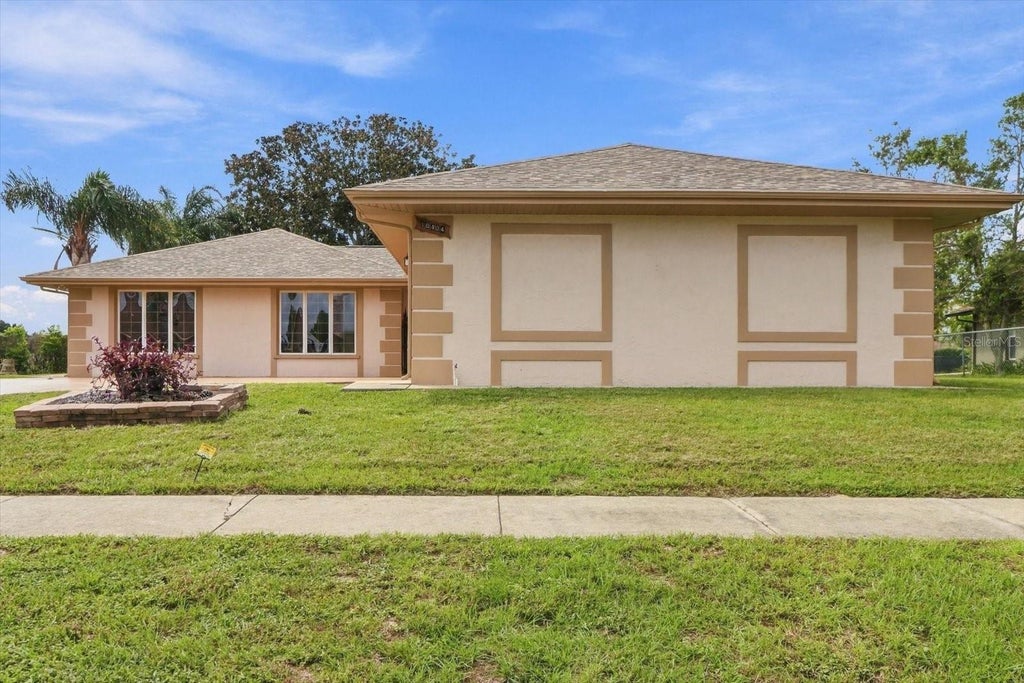 Photo of 10404 Sandtrap Drive, Spring Hill, FL 34608 (MLS # W7889853)
