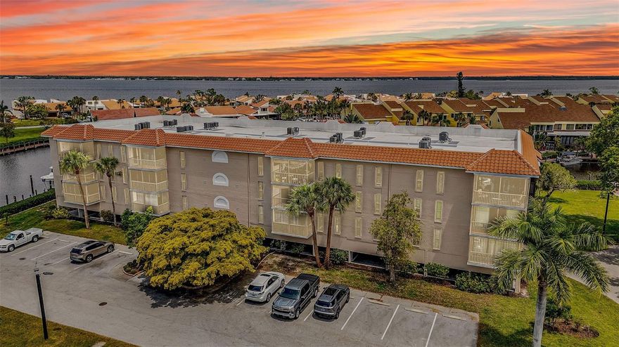 Welcome to your dream waterfront oasis in the heart of Punta Gorda! Nestled within a prestigious gated community, this stunning property offers a lifestyle of luxury and convenience. Enjoy breathtaking water views from your canal-front residence, complete with top-of-the-line stainless steel appliances in the upgraded kitchen. The impact windows and renovated bathrooms add a touch of modern elegance. With three sparkling pools, tennis courts, a clubhouse, boat ramp, and docks, there's endless fun to be had right at home. Plus, you're just moments from I75, offering quick access to beautiful beaches, renowned golf courses, vibrant restaurants, and fabulous shopping. Additional perks include under-building parking, extra storage, and the convenience of in-unit laundry. Turnkey furnished, this gem is ready for you to move right in and start enjoying the ultimate Florida lifestyle!