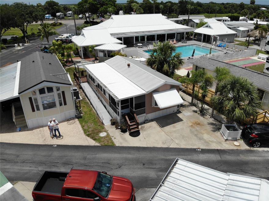 Big O RV Resort~ 55+ Community with active Lifestyles. 1 Bed 1 Bath remodeled & Updated. Updated kitchen with touchless faucet, stainless farm house sink, dishwasher. Newer tiled walk-in shower. Florida room added on (another bedroom) Laundry room inside, comes furnished. Nice back porch with a Gazebo. Plus you have the community pool with a privacy fence right out your backdoor! Shuffleboard is steps away. Large backyard. Metal roof with a newer AC. Metal handicap ramp which can be removed. What a cutie, priced for a quick sale!
