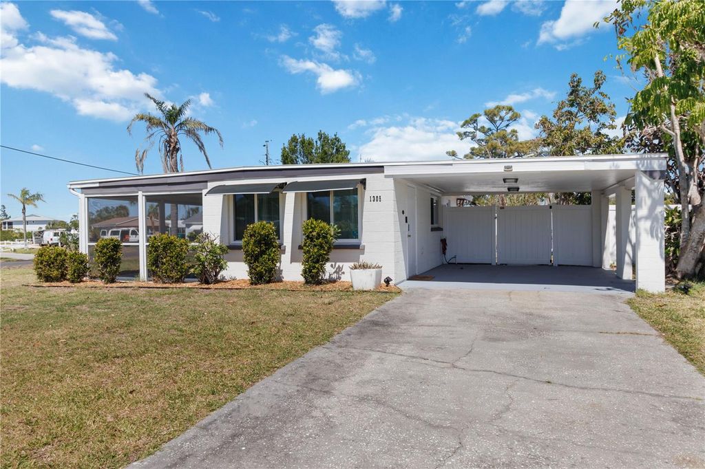 Photo of 1305 Rocky Creek Lane, Englewood, FL 34224 (MLS # D6145009)