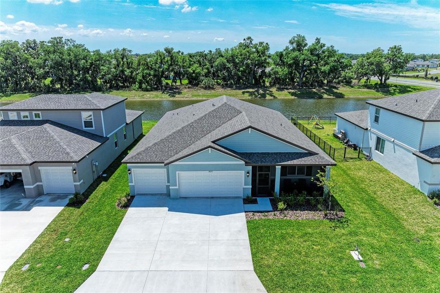 Welcome to effortless Florida living in this stunning, six-month new, Jasmine Floor Plan by Meritage Homes, perfectly positioned on a serene pond and preserve lot—offering peaceful water views, added privacy, and a true connection to nature. 

This beautifully designed 4-bedroom, 3-bathroom home with a 3-car garage is truly better than new construction, loaded with thoughtful upgrades and high-end finishes that elevate both style and functionality.

Step inside and you’ll immediately notice the elegant touches throughout, including crown molding in the foyer, gorgeous chandeliers in the foyer, hallway, dining area, and even the primary closet, creating a warm and luxurious ambiance. The open-concept layout flows seamlessly into a gourmet kitchen, perfect for entertaining, featuring premium finishes and ample space for gathering with family and friends.

The home has been meticulously enhanced with modern lighting and comfort features, including remote-controlled fans with integrated lighting in all bedrooms, living room, and both front and back porches, along with abundant recessed lighting throughout for a bright, inviting atmosphere.

Functionality meets convenience with a fully upgraded laundry room featuring premium cabinetry and shelving, as well as additional storage solutions throughout the home, including additional shelving in the storage closet.

Retreat to the spacious primary suite where you’ll find a spa-inspired bathroom complete with a rain shower head, along with upgraded vanity lighting, towel racks, and fixtures, each thoughtfully curated for a cohesive, upscale feel.

Tech and security are already in place, making this home move-in ready with peace of mind. Enjoy a full security camera system with DVR, paired with a 49” Samsung TV, capable of recording and storing up to 14 days of footage.

Outdoor living is just as impressive, with professionally installed and permitted front and back screened areas, allowing you to relax and take in the tranquil pond and preserve views year-round—without the hassle of bugs.

Additional upgrades that will suite the most discerning buyers includes epoxy-coated garage floor, 4 TV wall mounts, designer curtain rods, and a stylish butterfly fan chandelier in the flex room, upgraded bathroom fixtures in all 3 bathrooms,  adding even more value. Salt Meadows LOW HOA fee of under $13 per month

Beyond the home itself, the community offers an exceptional lifestyle with resort-style amenities, including a sparkling pool, fully equipped fitness center, clubhouse, basketball courts, pickleball courts, a tot lot, and a dog park—providing something for everyone to enjoy. 

This home offers the rare opportunity to enjoy the benefits of new construction without the wait or added expense of upgrades—all in a picturesque setting that truly feels like a retreat. 
Schedule your private showing today and experience the difference for yourself.