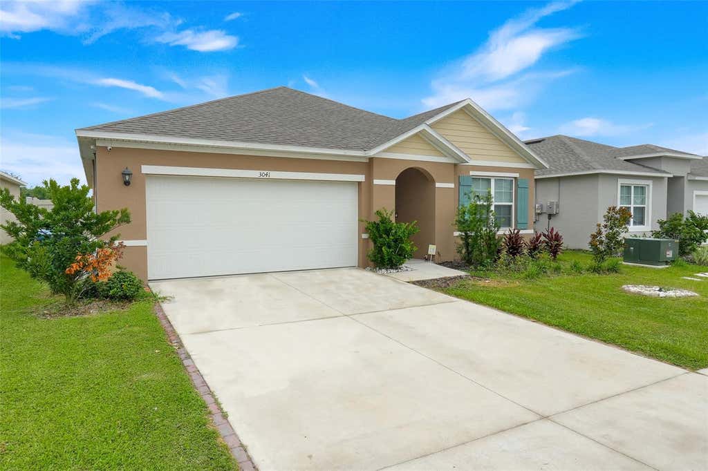 Photo of 3041 Tobago Drive, Haines City, FL 33844 (MLS # O6430979)