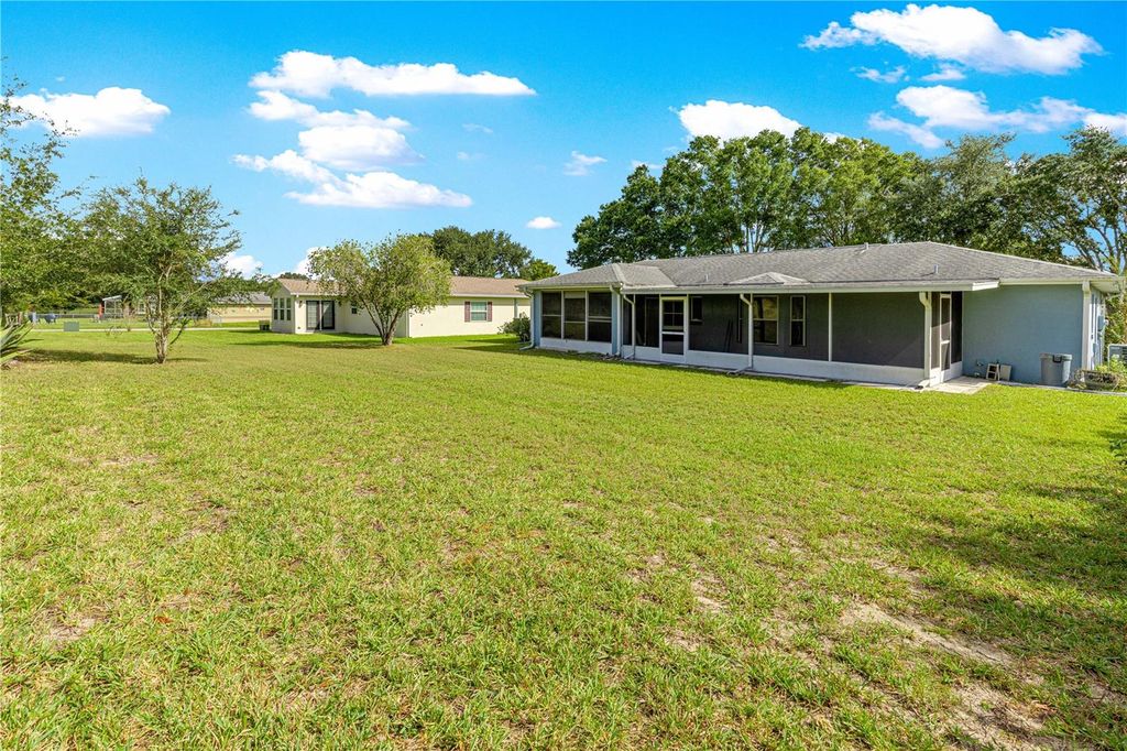 Photo of 10452 SW 62nd Terrace Road, Ocala, FL 34476 (MLS # OM709678)