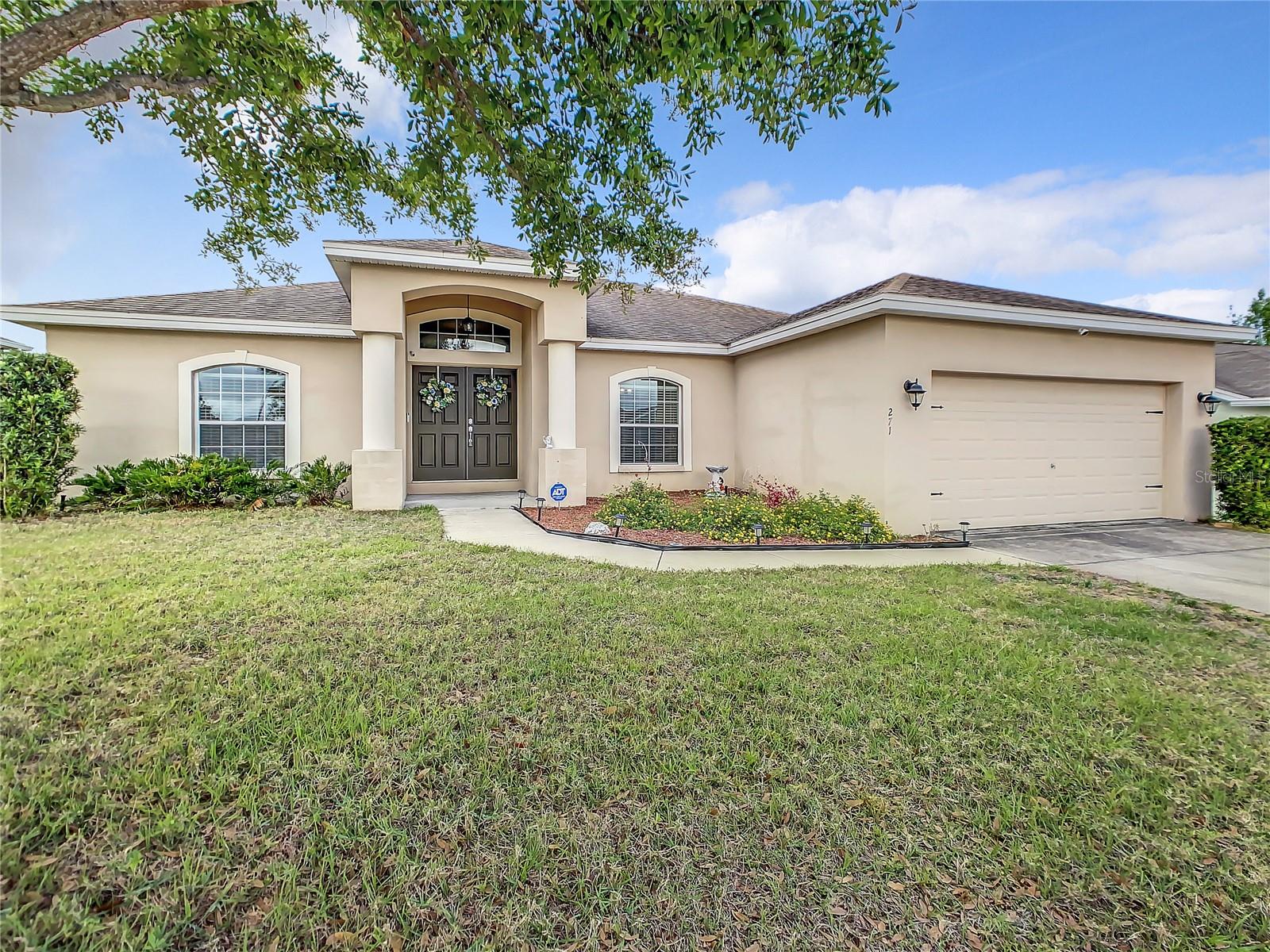 Buyers got cold feet. PRICE REDUCTION! Welcome to your beautiful 3/2 home with more that 1,800 feet of living space, and a 2-car garage in the Highland Meadows community! This amazing and well maintained home with no rear neighbors is ready for a new owner. The open living room is the ideal spot for a night at home with family or guests. The kitchen offers ample counter and cabinet space, granite counters, and an adjacent breakfast nook for additional dining space. Retreat to the master suite, which offers a spacious bedroom, adjoining bathroom with a double vanity, garden tub, and separate shower. Relax on the back porch overlooking the expansive backyard, the perfect place to unwind after a long day. Conveniently located near major roads and highways, this home is just a short drive away from all that Central Florida has to offer, including Disney World, shopping centers, the attractions, and more. Don't miss this opportunity to make this incredible home yours today!