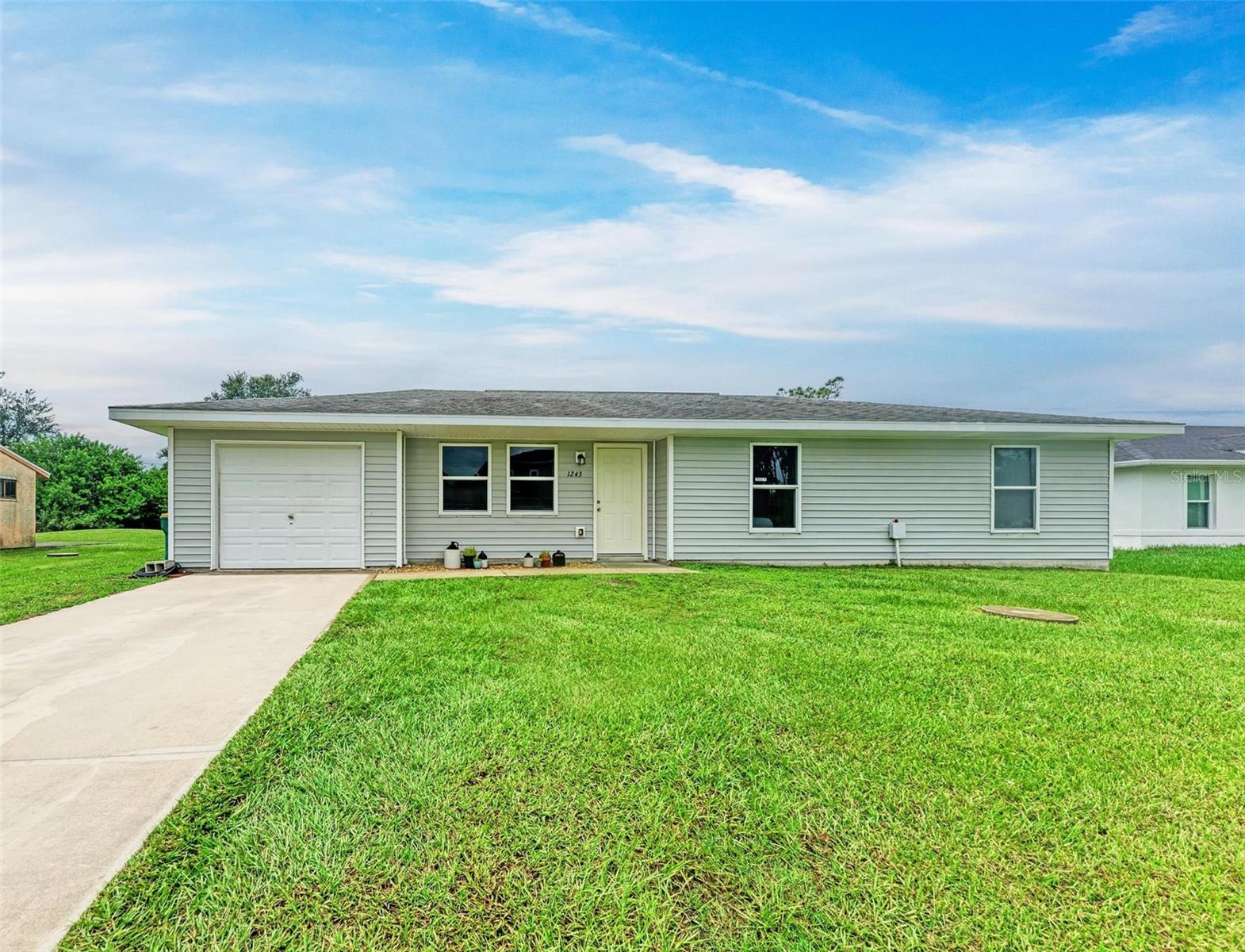 Welcome to this beautifully refreshed 3 bedroom, 2 bath home in the heart of Port Charlotte. Recently updated, the home features new appliances, high-end lamiated flooring, fresh interior paint, and stylish new fixtures throughout. With 1,088 square feet of comfortable living space, it offers a bright and inviting living area, a functional kitchen, and generously sized bedrooms, including a private master suite with its own bathroom. The property includes an attached garage with extended driveway and a spacious backyard offering plenty of room for entertaining, gardening, or even adding a pool. Set in a quiet neighborhood with no HOA, this home is ideally located near I-75, shopping, dining, schools, and the waterfront charm of downtown Punta Gorda. Whether you're a first-time buyer, a family seeking an affordable move-in ready home, or an investor looking for a strong rental or flip opportunity, this updated property is a must see. Schedule your showing today before it's gone!