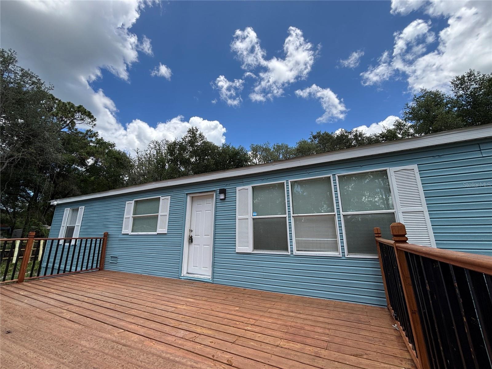 Welcome to peaceful country living! This well-maintained and move-in-ready 3-bedroom, 2-bath manufactured home sits on a generous 3.23-acre lot, zoned A1, offering a world of possibilities for agricultural use, livestock, gardening, or simply enjoying wide open space.
Step inside to find brand-new flooring throughout and a bright, open floor plan that offers both comfort and functionality. The home is being sold as-is, and includes new furniture and several recent upgrades. The bathrooms have been thoughtfully renovated with new sinks, showers, toilets, and fixtures—bringing a fresh, modern feel to the space.
Enjoy the outdoors from two spacious, updated decks in the front and back, perfect for relaxing evenings, entertaining guests, or taking in the scenic views of your expansive property.
This property combines the best of rural charm with modern updates, and with A1 zoning, it provides flexibility for a variety of uses—whether you're dreaming of starting a small farm, building a workshop, or just having room to roam.
Don't miss this rare opportunity to own a beautifully updated home with land and flexibility. Schedule your showing today!