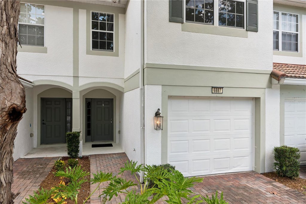 Photo of 6887 Sperone Street, Orlando, FL 32819 (MLS # O6424770)