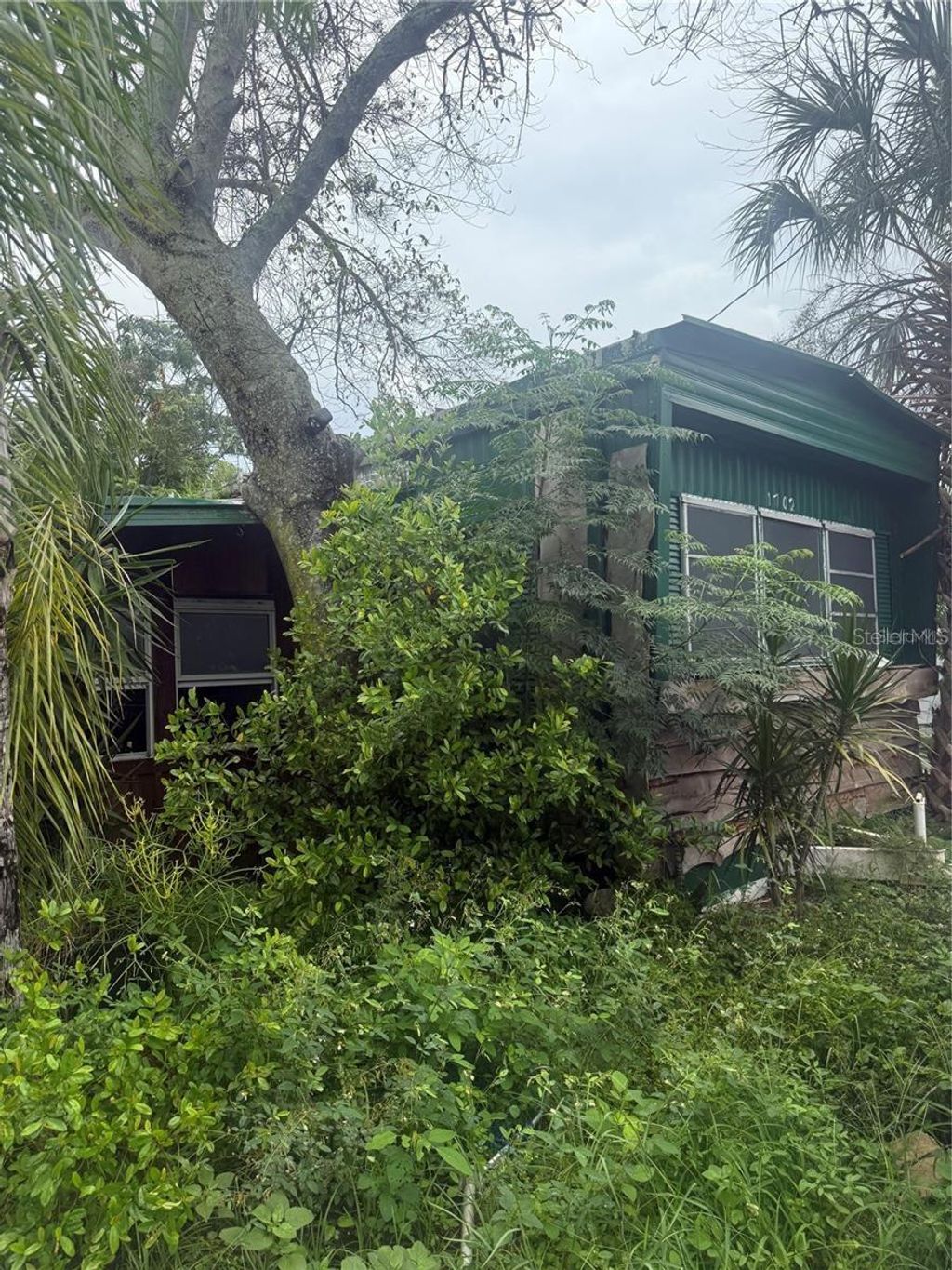 Photo of 1702 Holiday Drive, Holiday, FL 34691 (MLS # TB8446391)