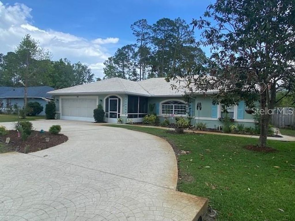 Photo of 8 Brigadoon Lane, Palm Coast, FL 32137 (MLS # FC310859)