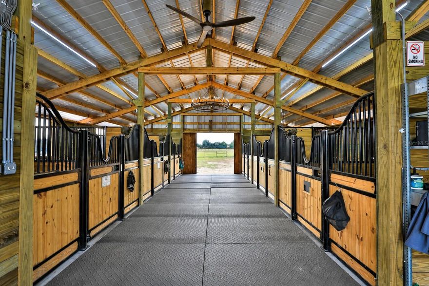 Where country living meets elite equestrian wellness — a truly one-of-a-kind horse property designed for performance, comfort, and care.
 
Nestled on 9.34 high-and-dry acres, this exceptional equestrian estate offers a rare combination of modern country living and state-of-the-art horse wellness amenities. Built in 2006, the beautifully maintained 3-bedroom, 2-bathroom single-story home features 2,372 sq ft of living space and blends comfort, functionality, and timeless style — all thoughtfully positioned within a fully equipped horse facility created with the animal’s well-being as the highest priority.
Inside the home, you’ll find an inviting open layout with cathedral ceilings, a cozy family room fireplace, and a seamless kitchen/family room combination ideal for everyday living and entertaining. The spacious Master Bedroom includes a walk-in closet. The roof was replaced in 2023, and the air-conditioning system was replaced in September 2024, offering peace of mind for years to come.
 
Step outside and discover what truly sets this property apart.
 
This farm has been meticulously designed as a premium equine wellness retreat, offering features rarely found anywhere else:
 
Equine Therapy & Wellness Facilities
• Climate-controlled full-body infrared therapy room featuring 7 adjustable wavelengths for targeted or full-body treatment
• Infrared panels can be removed, allowing the space to be converted into a climate-controlled tack room or grooming area
• Climate-controlled Himalayan salt therapy room, lined with authentic salt bricks to support respiratory health and skin condition
• Both wellness rooms are suitable for horses, dogs, and even human use
Professional Equestrian Infrastructure
• Barn with 6 Saratoga stalls, fans, grooming area, wash rack, and tack room
• hay storage barn
• Excellent barn ventilation for optimal airflow and horse comfort
• Integrated misting system to cool horses during hot Florida summers
• Additional barn with 2 stalls with dutch doors equipped with a misting system
• Riding arena for training and exercise
Thoughtful Horse-First Design
• Automatic waterers throughout pastures, dry lots, and barns
• Freeze-protected well, ensuring a reliable supply during colder weather
• Multiple pastures plus two spacious dry lots, ideal for horses requiring controlled grazing while still allowing freedom of movement
• Fenced grounds and carefully planned layout prioritizing safety and efficiency
With an attached 2-car garage, well and septic utilities, and expansive usable acreage, this high-and-dry property offers privacy, functionality, and endless possibilities.
Every detail of this estate was created for the horse. Whether you are a competitive rider seeking a training base or an owner caring for horses with special health needs, this extraordinary property delivers a level of equine comfort and innovation rarely available on the market.
A truly unique opportunity — properties like this simply do not exist twice.