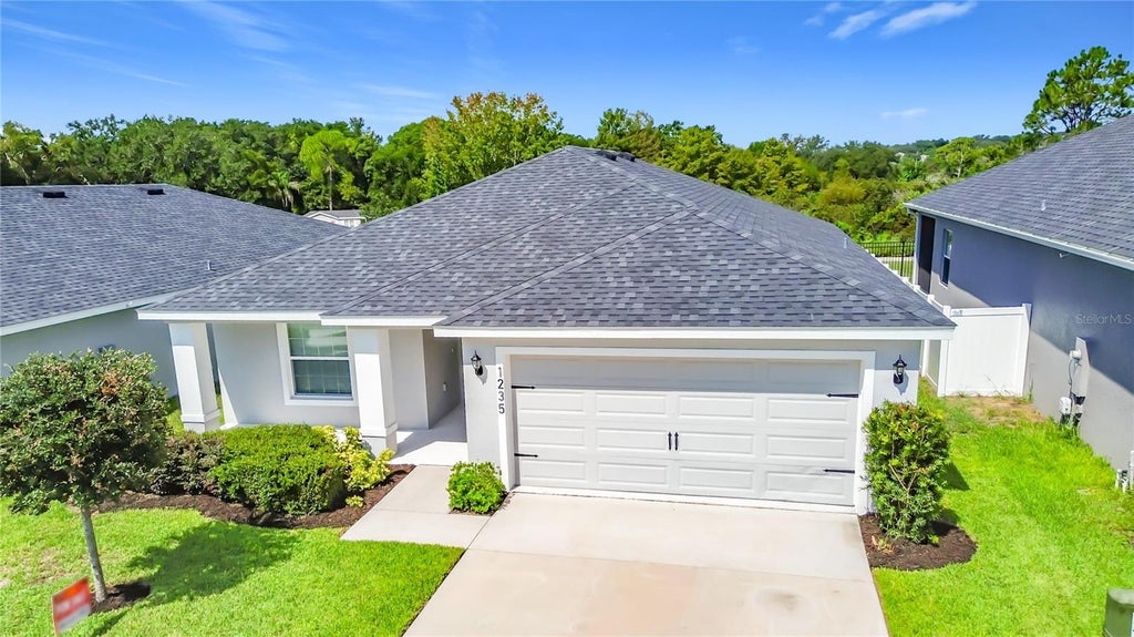 Photo of 1235 Mountain Flower Lane, Davenport, FL 33837 (MLS # O6435251)