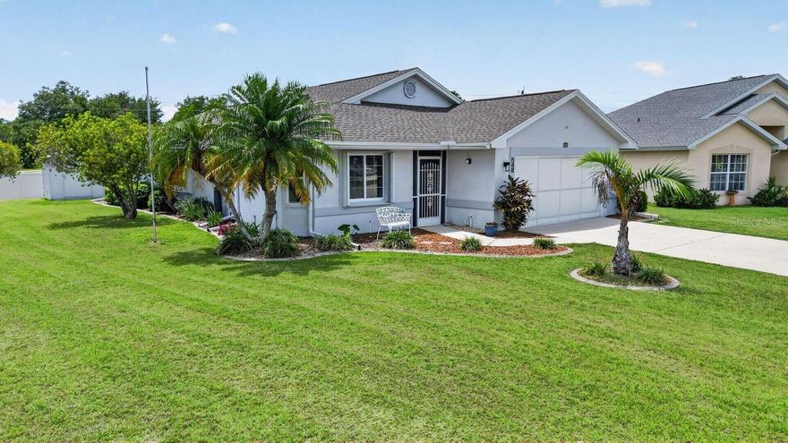 SITUATED ON A RARE DOUBLE LOT, this beautifully maintained home in Oak Hollow delivers exceptional space, privacy, and value in one of the area’s most desirable deed-restricted communities. From the moment you arrive, the glass impact front door and screened front porch set the tone for a welcoming and well-cared-for residence.

Inside, high ceilings and a freshly painted interior create a bright, open feel. The kitchen is both functional and inviting, featuring Corian countertops, stainless steel appliances (approx. 2 years old), a vented microwave to the exterior, abundant cabinetry, and a charming eat-in dining area.

Thoughtful upgrades continue throughout, including an LG washer/dryer combo (approx. 2 years old), linen closet, and pull-down attic stairs for added storage. The living space flows seamlessly to the lanai, complete with a motorized sunshade and impact-rated door for comfort and peace of mind.

Designed for easy Florida living, the exterior offers accordion hurricane shutters, a new garage screen, and a shed for additional storage. Major updates include a 2023 roof, 2019 AC with ultraviolet light, upgraded electrical system (2019), whole-house water filtration system, and a 22KW whole-house generator serviced annually, along with a new garage door opener.

Residents of Oak Hollow enjoy access to a heated pool, fitness center, clubhouse, and tennis courts, all within a beautifully maintained community.

A rare combination of space, upgrades, and location—this move-in-ready home is ideal for enjoying the Florida lifestyle year-round.