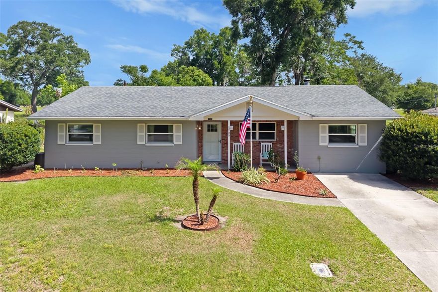 Welcome to this updated three-bedroom, two-bath home in the heart of charming Bartow. Thoughtfully renovated in 2019, this move-in ready property offers peace of mind with major updates completed, including new electrical, upgraded plumbing and updated windows. The air conditioner was replaced in 2021 for added efficiency and comfort. Inside, find stylish LVP flooring flowing throughout the home and a functional living design featuring both a formal living room and a spacious family room centered around a cozy wood-burning brick fireplace, perfect for relaxing evenings or entertaining guests. The galley-style kitchen has been tastefully updated with modern cabinetry and countertops and offers space for a kitchen table for casual dining. The primary suite features a remodeled bath with a walk-in shower and updated vanity, while the guest bath has also been beautifully renovated with a shower and single vanity. Additional highlights include an oversized inside laundry room with abundant storage space, a spacious rear lanai ideal for enjoying Florida evenings and a fully fenced backyard complete with a 12-by-20-foot storage shed for all your tools, toys or hobbies. Located in historic Bartow, known for its small-town charm, beautiful architecture, local parks, dining and community events, this home offers the perfect blend of comfort, convenience and Florida lifestyle living. Conveniently near shopping, schools, restaurants and major roadways for easy commuting throughout Central Florida.